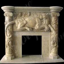 hand carved limestone fireplace