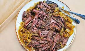 slow cooked skirt steak and onions