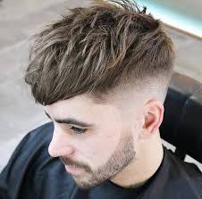 High taper fade this is one of the most popular fade haircut men, where the hair becomes gradually faded with the color of the skin from about 2 inches from the top.this hairstyle suits perfectly those having black hair. 45 Classy Taper Fade Cuts For Men