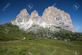 It is best known as a touristic skiing, rock climbing, and woodcarving area. Sassolungo Val Gardena Dolomites Italy The Sassolungo Alp Standing Over Colorful Fields During The Summer Season In Val Gardena Trentino Alto Adige Italy Stock Photo Picture And Royalty Free Image Image 104416730