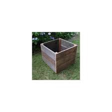 Using cedar, wood glue, a miter saw, power drill, nails, skil saw, and screws, you can create this in a few hours. Rustic Reclaimed Wood Planter Box 20x20