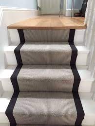 grey carpet with black border to stairs