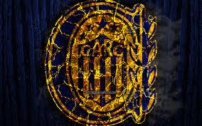 As the my friend leandro requested, argentina primera division club based in rosario. Download Wallpapers Ca Rosario Central Scorched Logo Argentine Primera Division Blue Wooden Background Argentinean Football Club Argentine Superleague Grunge Rosario Central Fc Soccer Rosario Central Logo Argentina For Desktop With Resolution