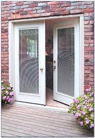 french doors with blinds between the