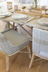 brown rope chairs at trestle table