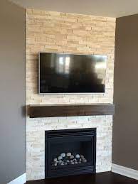 family room corner fireplace with tv