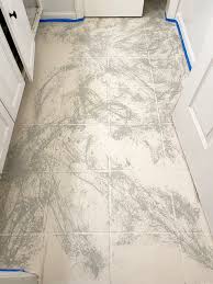 paint a tile floor to mimic stone