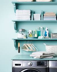 Wood shelf + hanging rod. 12 Essential Laundry Room Organizing Tips Martha Stewart