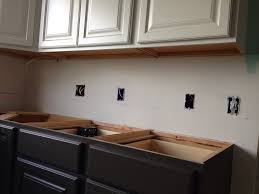 painted semi custom upper cabinets