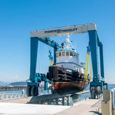 marine travelift delivers boat hoist to