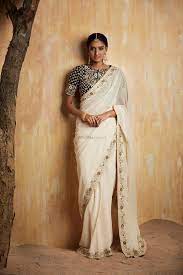 photo of white saree with black blouse
