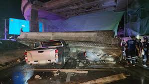 u turn bridge beam collapses onto a car