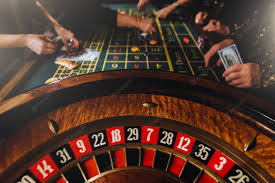Premium Photo | Casino theme. unrecognisable gamblers play casino on money.