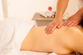 Body Care. Spa Body Massage Treatment. Woman Having Massage In The Spa  Salon Stock Photo, Picture And Royalty Free Image. Image 93696831.
