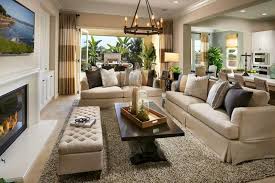 The dark wood floor and the white walls make for an amazing color combination and the floor to ceiling french style doors leading to the green courtyard outside offer a beautiful contrast to the overall design while letting light flood the living room. Luxury Living Room Design Ideas Layjao