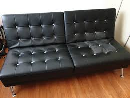 foldable sofa bed in faux leather