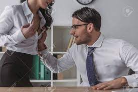 Excited Businessman Touching Breast Of Sexy Secretary In Office Stock  Photo, Picture and Royalty Free Image. Image 143849513.