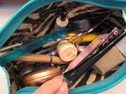 a look inside my makeup bag oh she glows