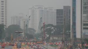 A hazy sunset in kuala lumpur as haze blankets the city on august 24, 2015. Malaysia Closes Schools As Indonesia Smoke Haze Worsens
