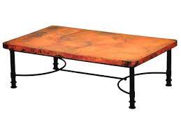 This copper coffee table features include hand hammered copper top and fired just like the old world tradition giving its many variations and makes each copper panel a work of art, no two copper tops will alike. Copper Top Coffee Table Artisan Crafted Home