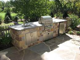 Outdoor Kitchen With Bluestone Patio