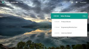 The first thing that you'd probably notice is the background. Google Workspace Updates Updates To Hangouts Meet Home Screen And Screensaver On In Room Displays
