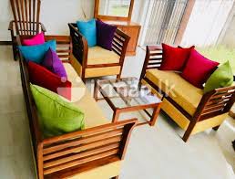 teak wooden sofa set with coffee table