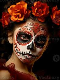 kid in day of the dead makeup with