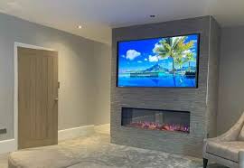 Build A False Wall For Tv And Fireplace