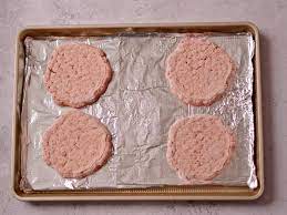 how long to cook frozen burgers in oven