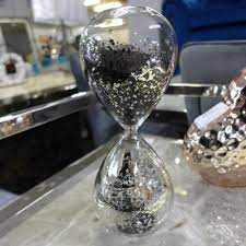 A Silver And Black Sand Small Hourglass