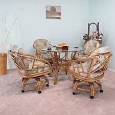 Designing and decorating a dining room is just as difficult as decorating any other room. Amazon Com Urbandesignfurnishings Com Made In Usa Rattan Chiba Dining Caster Chair Table Gaming Furniture 5 Piece Set Honey Island Sandstone Table Chair Sets