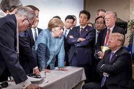 Angela merkel receives standing ovation after farewell speech. G 7 Summit Angela Merkel And Donald Trump In Viral Photo Time