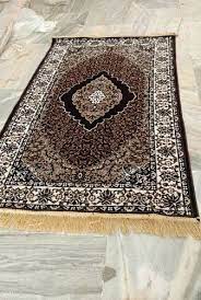 briwnt designer silk carpets weave