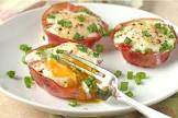 baked egg in ham cups with parmesan and green onion