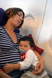 8 Tips To Survive Flying With A Baby