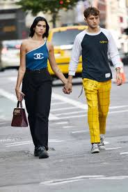 Also getting in the spirit is dua lipa, the pop singer who consistently steals my heart with her music and her sartorial choices. Dua Lipa And Anwar Hadid Bring California Couple Style To The East Coast Vogue
