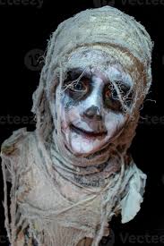 halloween cosplay of scary mummy pose