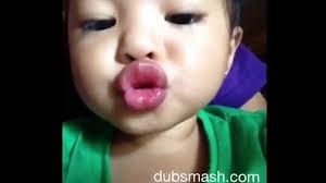 funny baby with pouty lips dubbing let