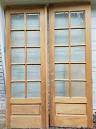 oak double doors with patterned glass