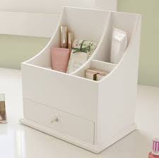 white wooden cosmetic organiser by