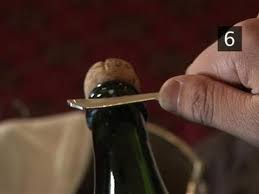 You will need to use the strong spoon for this trick and off course a strong grip. How To Pop Open A Champagne Bottle With A Spoon Youtube