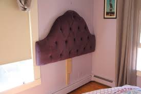 mount an upholstered headboard to the