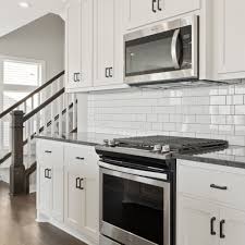 I'm with you … i like all my hardware to match throughout the house! Hanson Builders Newport Kitchen Matte Black Kitchen Hardware Matte Black Kitchen Black Granite Kitchen