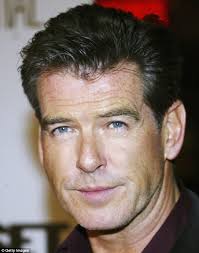 My mom has black hair and brown eyes and my dad had blonde hair and very blue eyes. Pierce Brosnan Gene That Gives People Freckles Dark Hair And Blue Eyes Discovered By Scientists Daily Mail Online