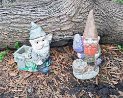 faux cement and moss painted garden gnomes