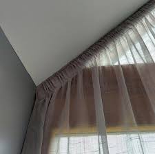 how to hang curtains on apex and angled