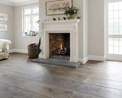 Here are the top 10 ideas for wood floors designs classic touches in the living rooms are impeccably elegant and sophisticated. 9 Best Living Room Flooring Ideas And Designs For 2021