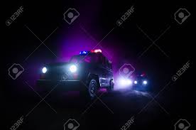 Speed Lighting Of Police Car In The Night On The Road Police