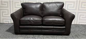 brown round arm leathaire regular sofa